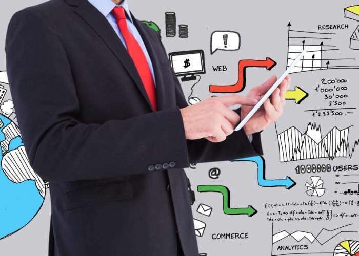 elegant-businessman-with-tablet-background-graphics